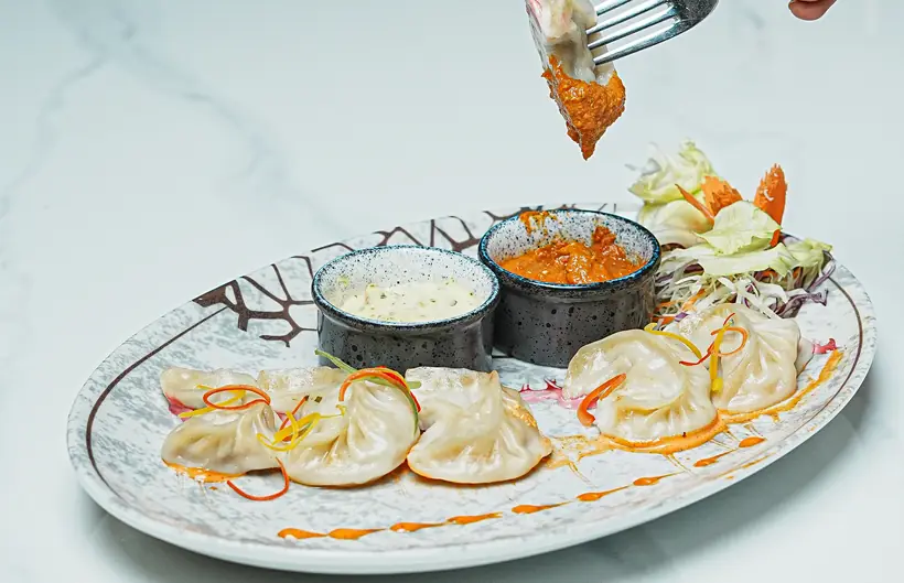 Chicken momos on a plate