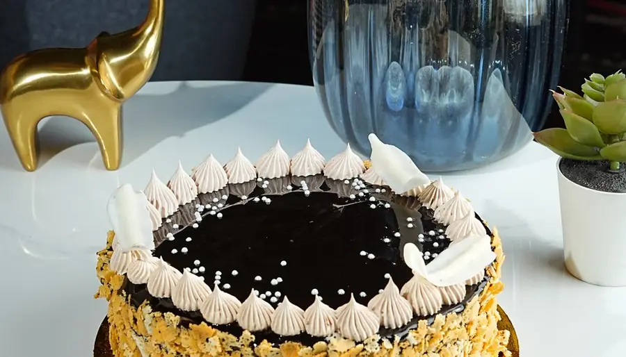 Chocolate truffle cake with piped cream