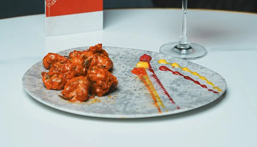 Peri peri chicken wings on a plate